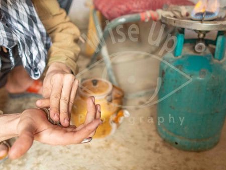 Hand-pressing hashish, Mazar-i Sharif, Afghanistan.