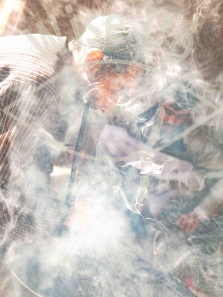 Chillum smoker in hashish fumes, Tashkurghan, Afghanistan